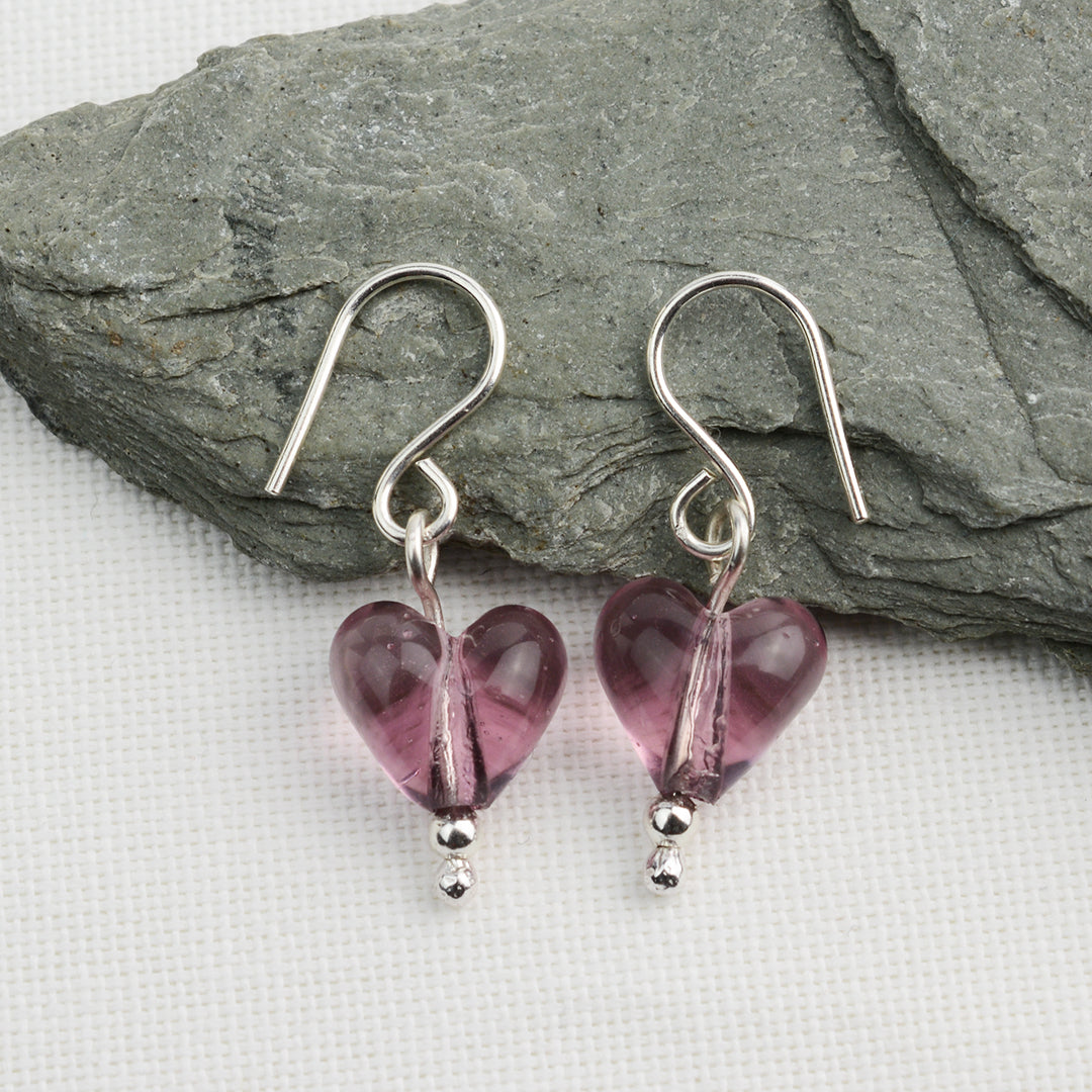 Heart shaped amethyst glass beads on silver drop earring hooks