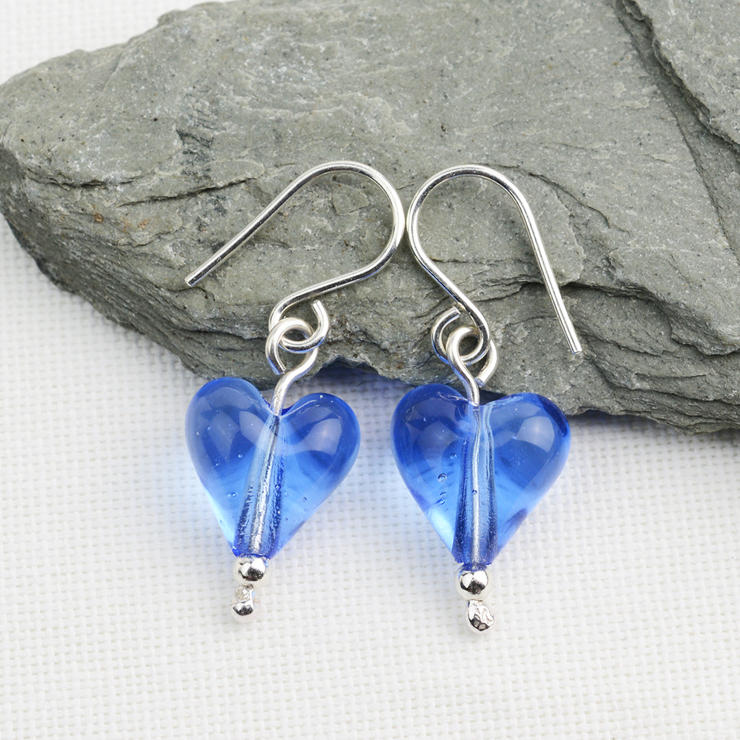 Heart shaped blue glass beads on silver drop earring hooks