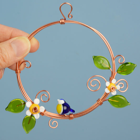 Miniature copper wreath with glass blue tit, flowers and leaves
