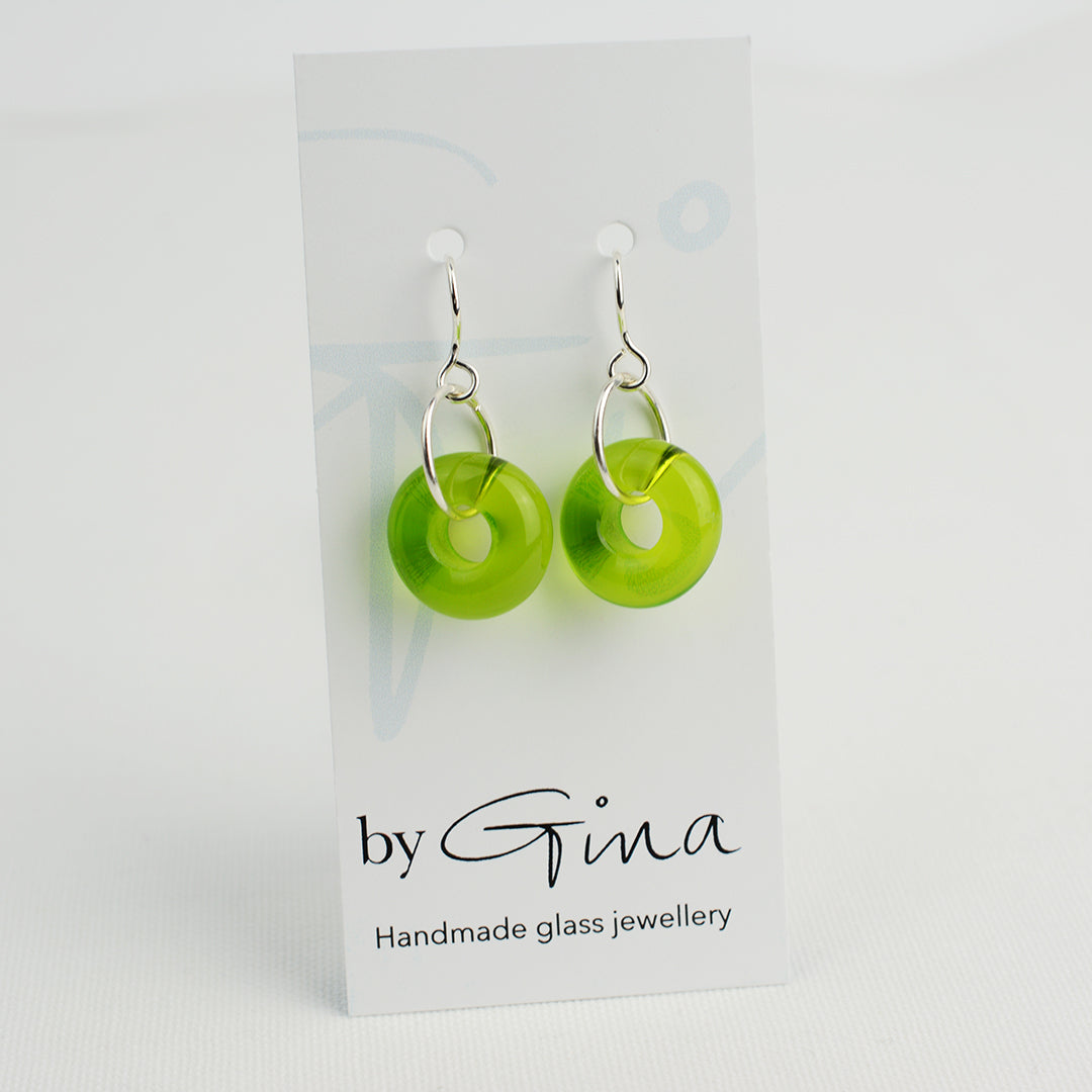 Lime green glass doughnut shaped beads on silver drop earrings