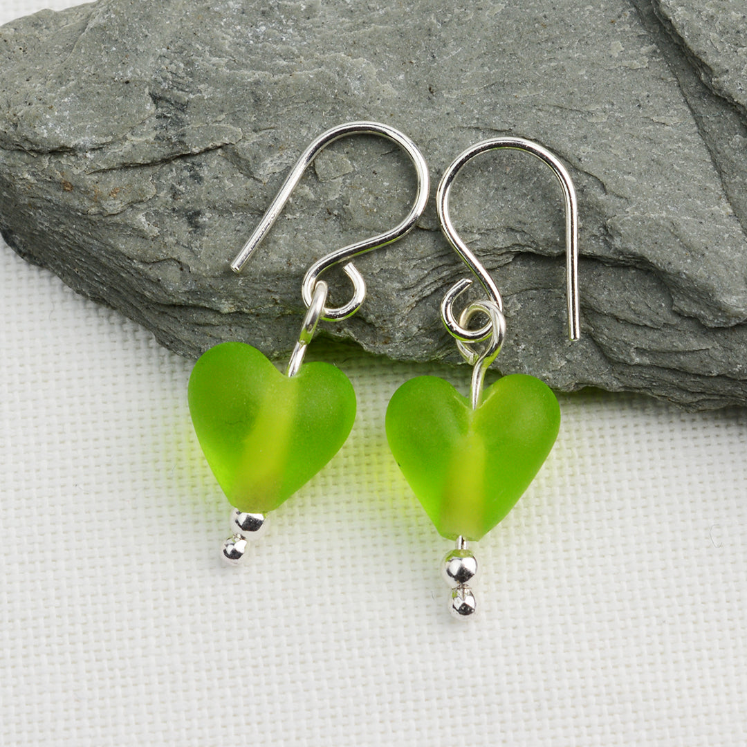 Heart shaped lime green etched glass beads on silver drop earring hooks
