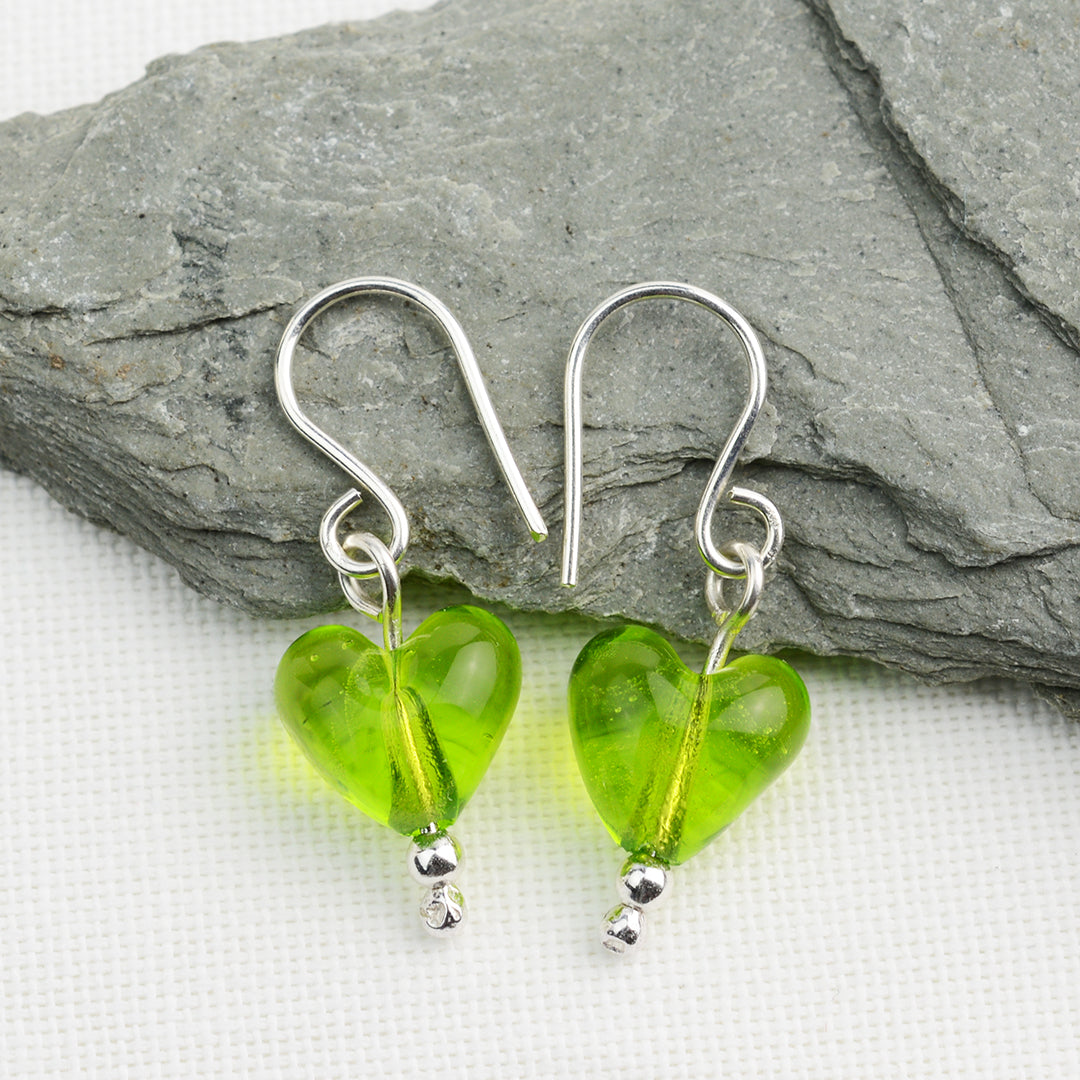 Heart shaped lime green glass beads on silver drop earring hooks