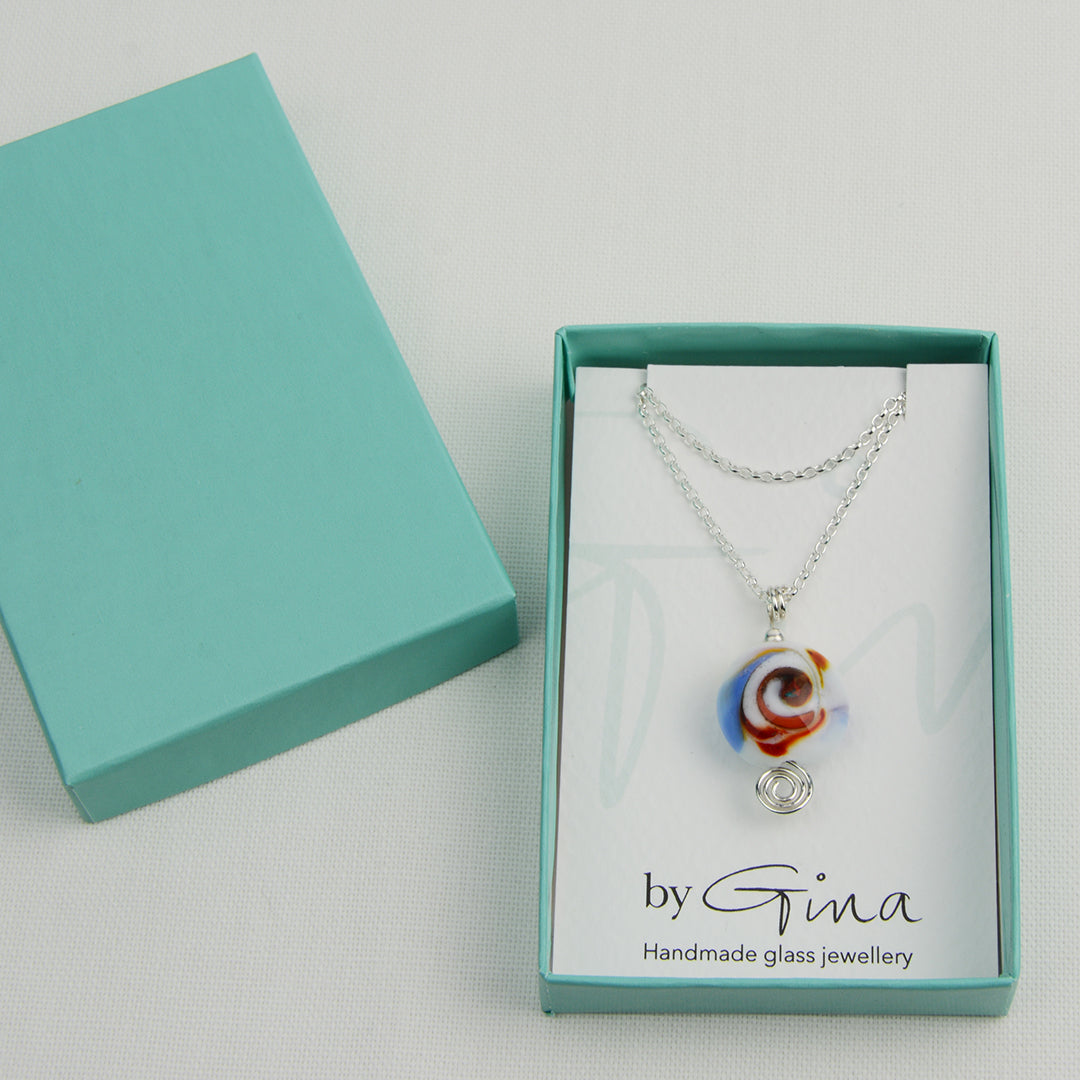 Multi coloured swirly lentil shaped glass bead pendant  on silver chain in turquoise gift box