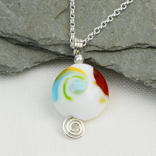 Multi coloured swirly lentil shaped glass bead pendant  on silver chain