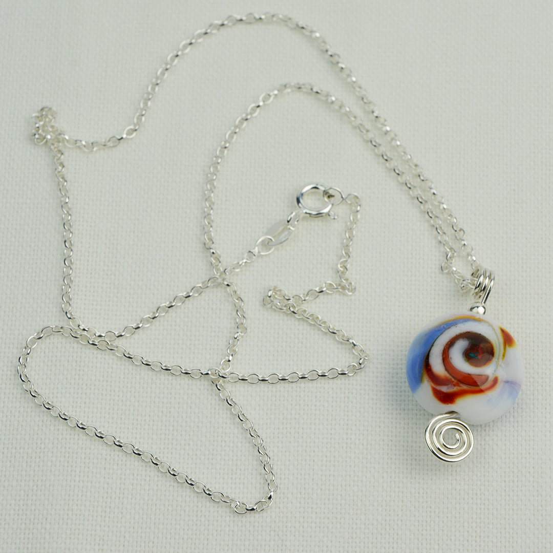 Multi coloured swirly lentil shaped glass bead pendant  on silver chain