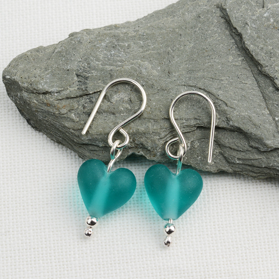 Heart shaped teal etched glass beads on silver drop earring hooks