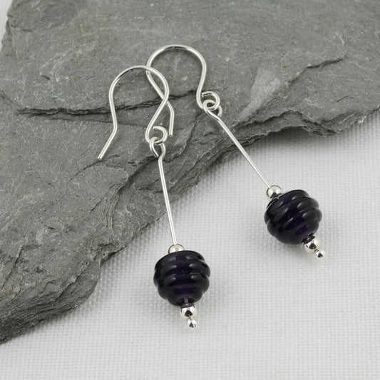 Beehive shaped deep purple glass beads on silver drop earring hooks