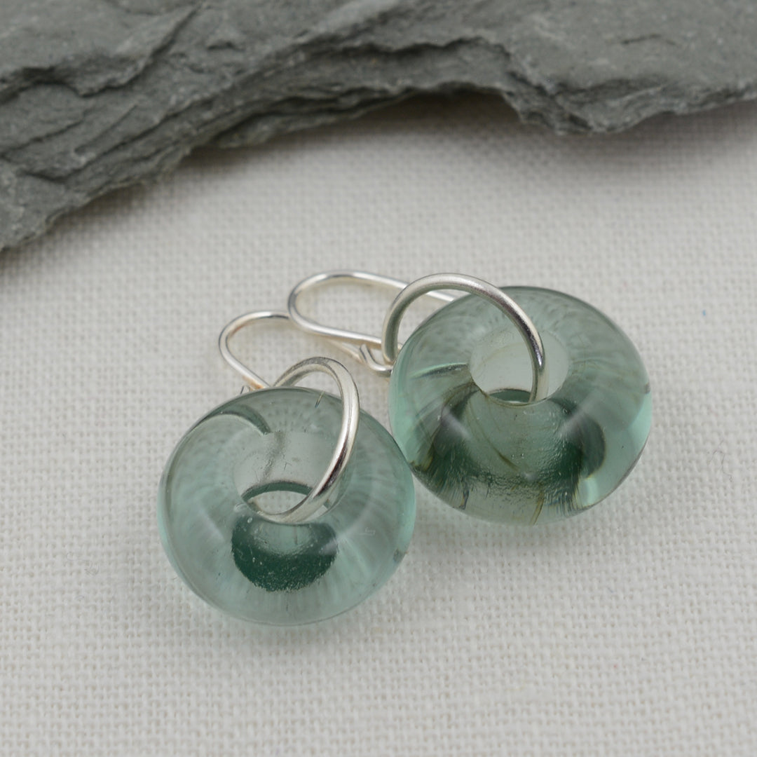 Doughnut shaped slate grey glass beads on silver drop earring hooks