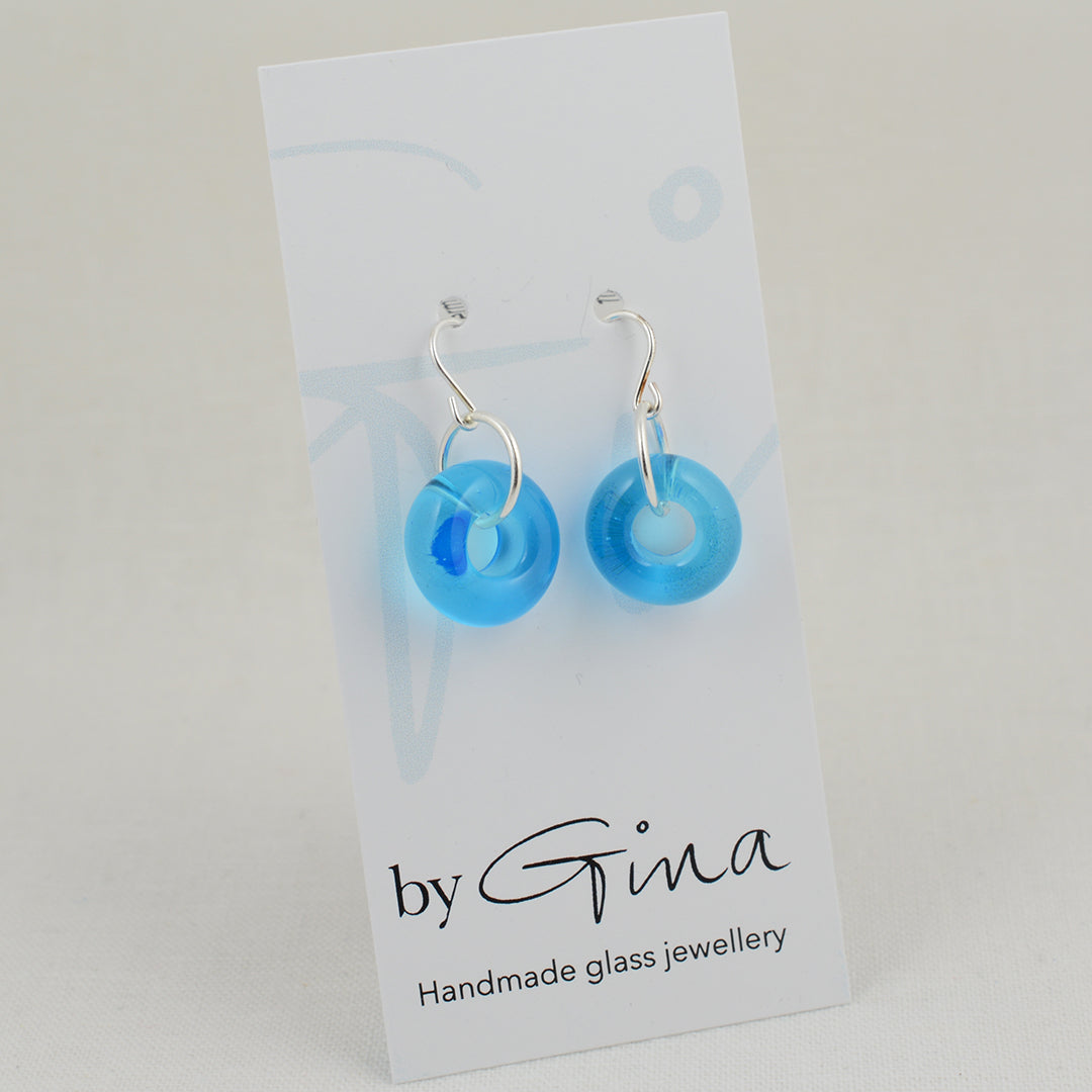 Doughnut shaped turquoise glass beads on silver drop earring hooks