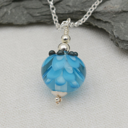 Turquoise glass beads imploded flower pendant on silver chain