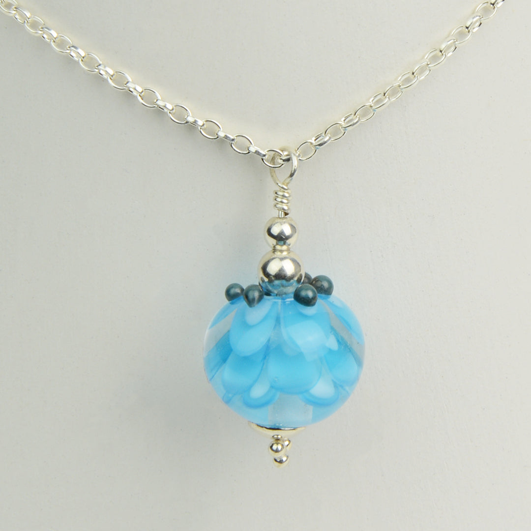 Turquoise glass beads imploded flower pendant on silver chain