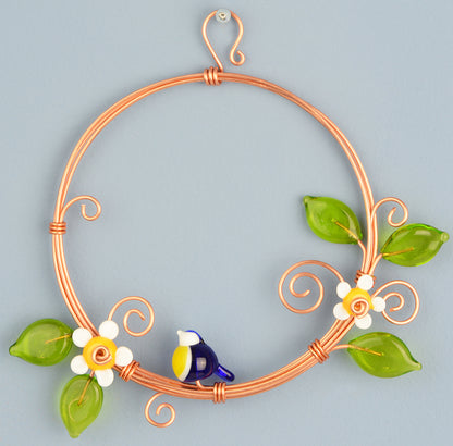 Miniature copper wreath with glass blue tit, flowers and leaves