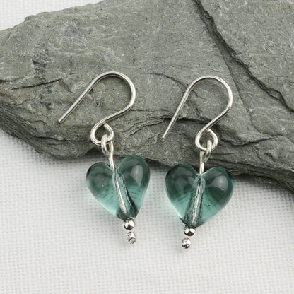 Heart shaped slate grey glass beads on silver drop earring hooks