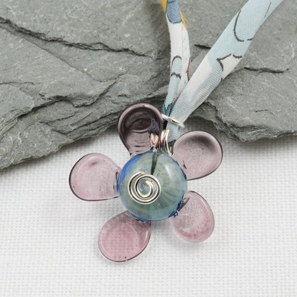 Purple and grey glass flower pendant on Liberty cord necklace