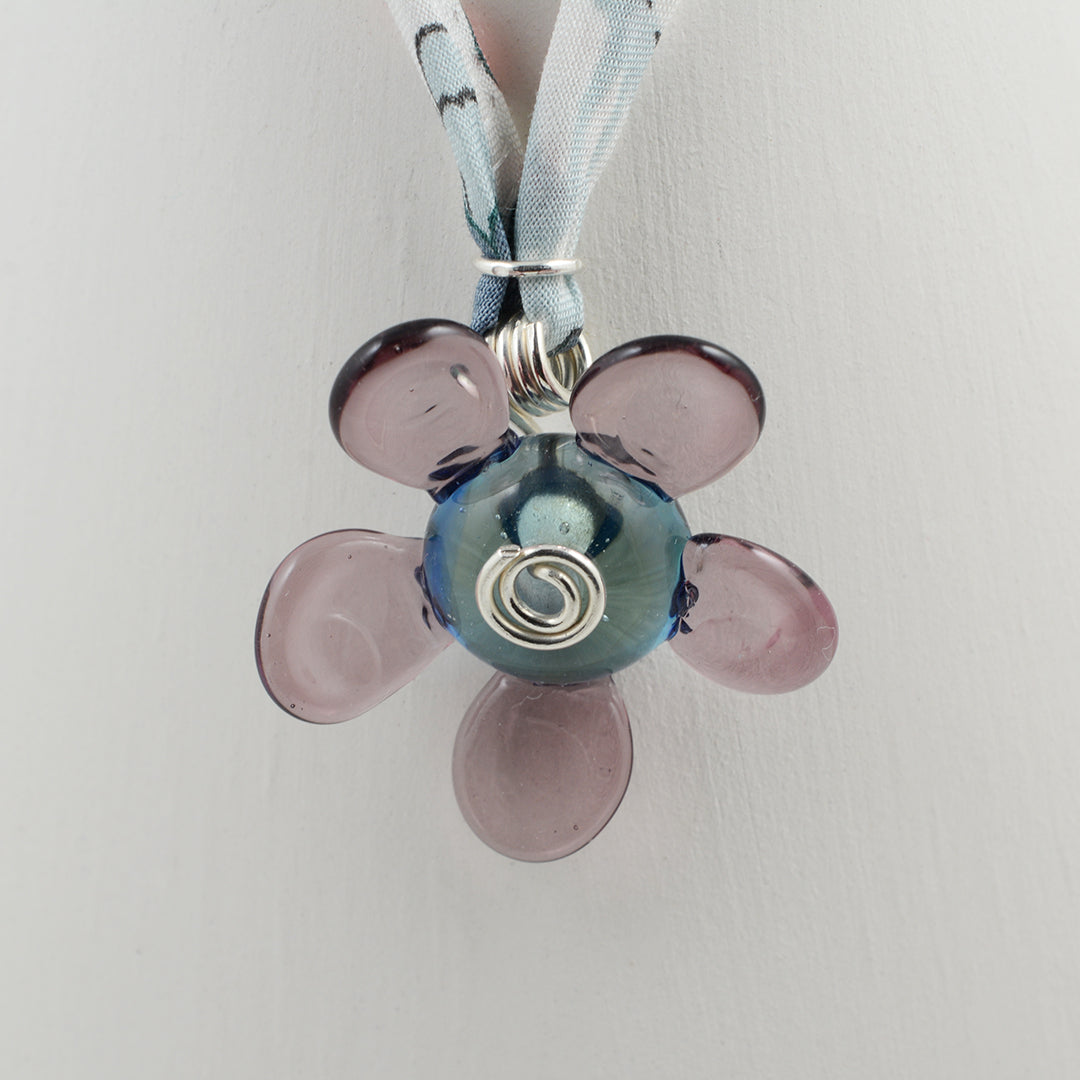 Purple and grey glass flower pendant on Liberty cord necklace