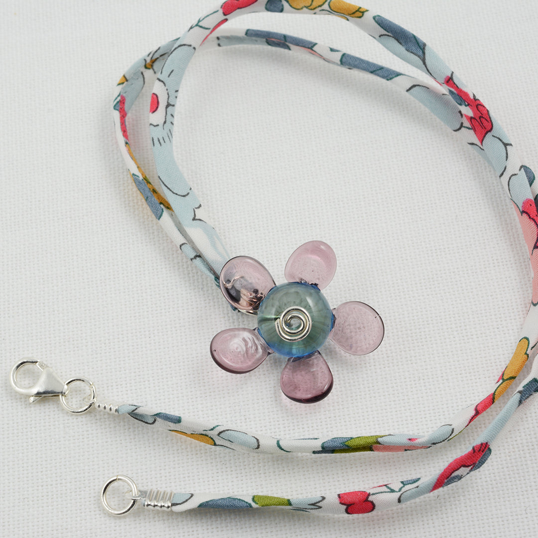 Purple and grey glass flower pendant on Liberty cord necklace