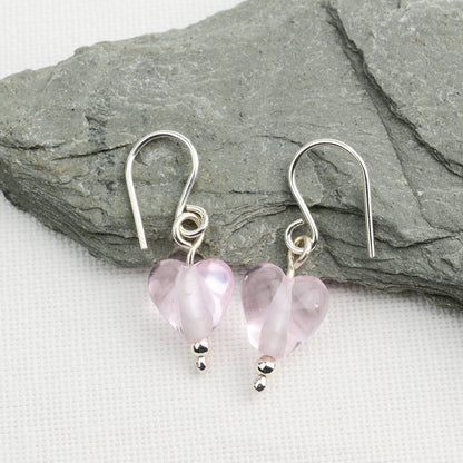 Heart shaped pale pink glass beads on silver drop earring hooks