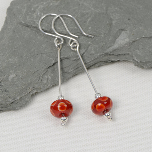 Red and white layered spots glass bead earrings