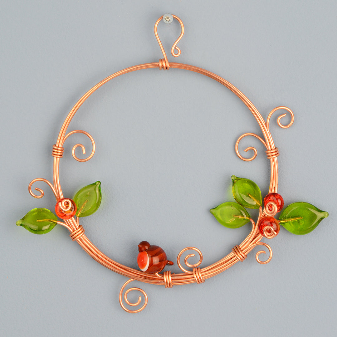 Miniature copper wreath with glass robin, berries and leaves