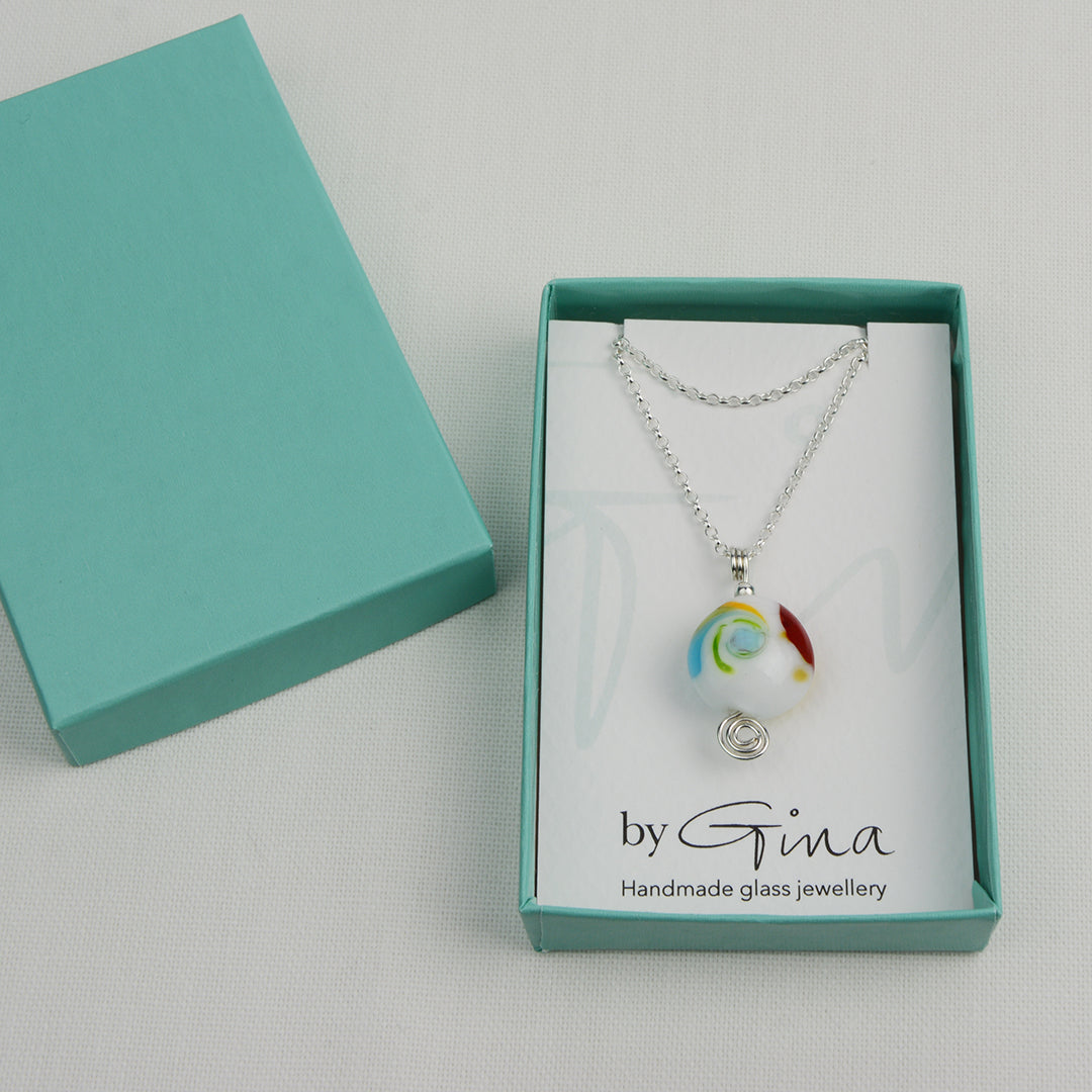 Multi coloured swirly lentil shaped glass bead pendant  on silver chain in turquoise gift box