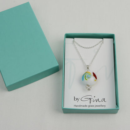 Multi coloured swirly lentil shaped glass bead pendant  on silver chain in turquoise gift box