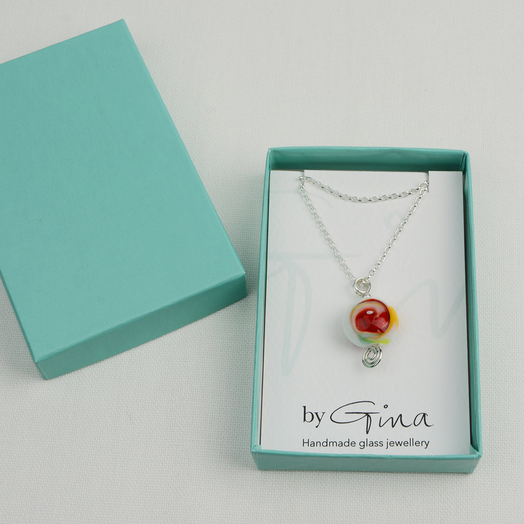 Multi coloured swirly lentil shaped glass bead pendant  on silver chain in turquoise gift box