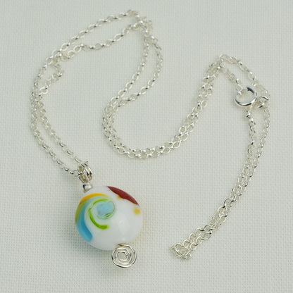 Multi coloured swirly lentil shaped glass bead pendant  on silver chain