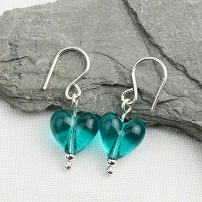 Heart shaped teal glass beads on silver drop earring hooks