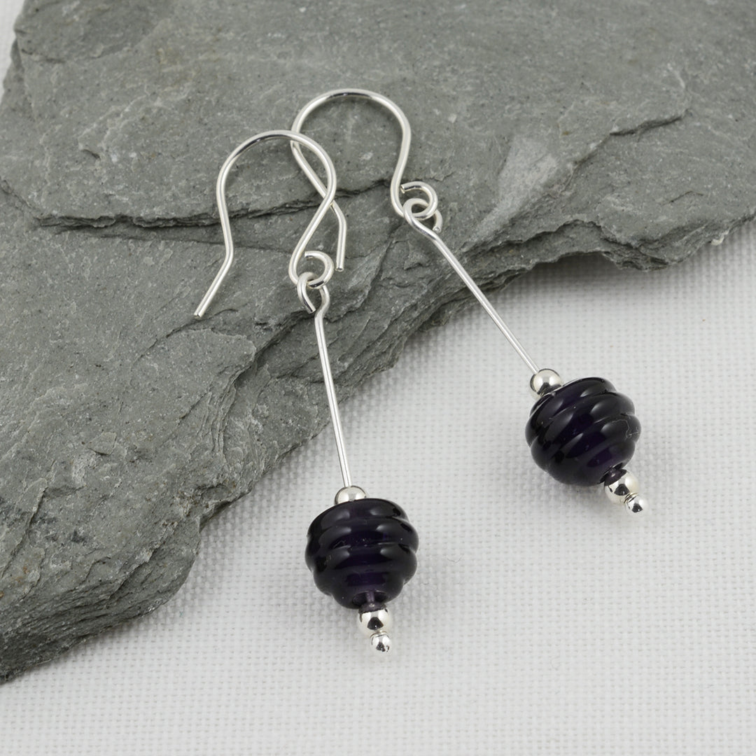 Beehive shaped deep purple glass beads on silver drop earring hooks